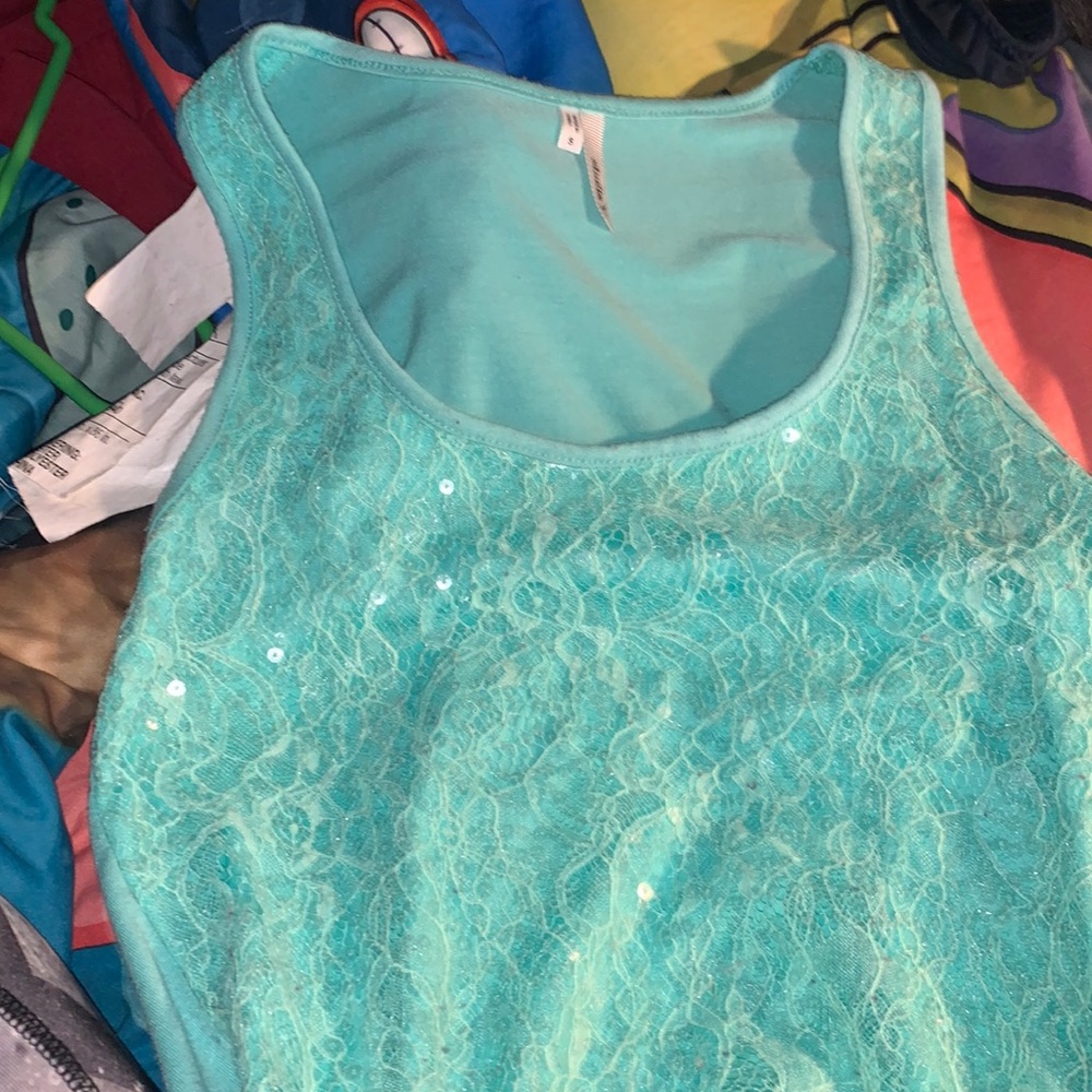 light blue tank top. lace and sequins on front
